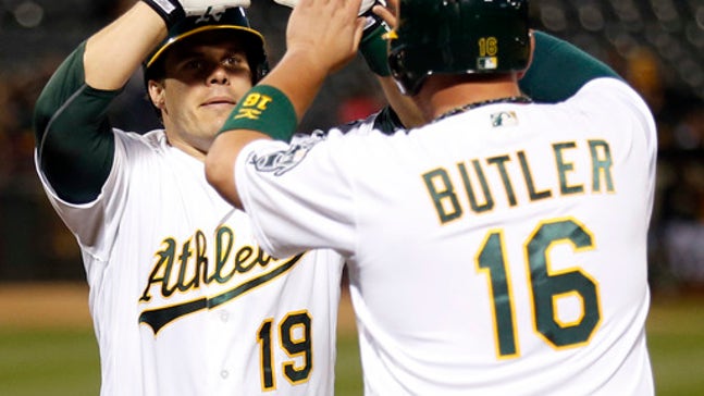 Davis homers, drives in 5 and A's roll over Rangers 14-5